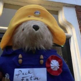 Paddington standing outside George Orwell's house in Hampstead